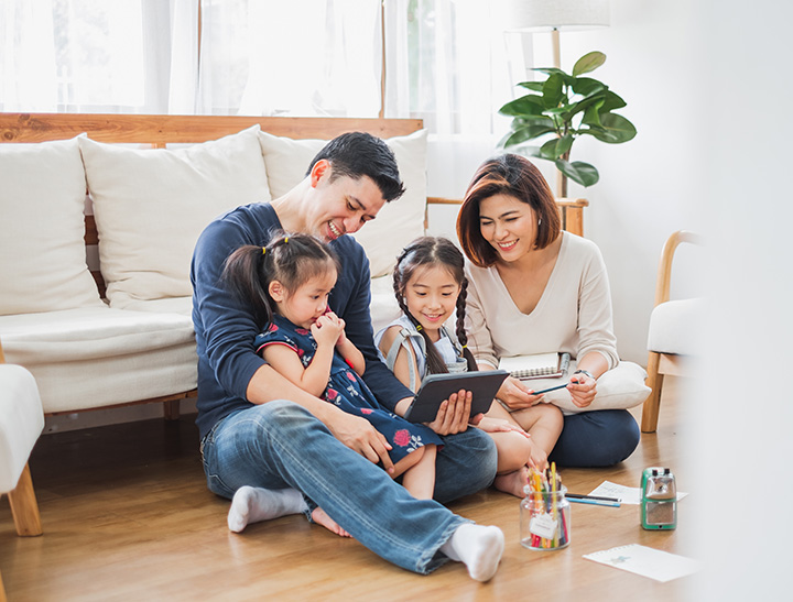 Image of a young family in their new home.